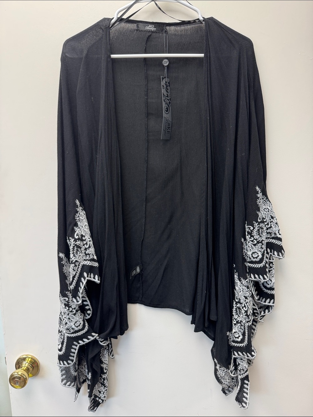 BKE Black Shrug with White Embroidered Hem